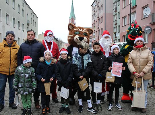 Grafika 58. Wręczanie upominków